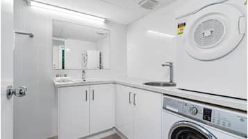 Hair dryer, towels, soap, shampoo