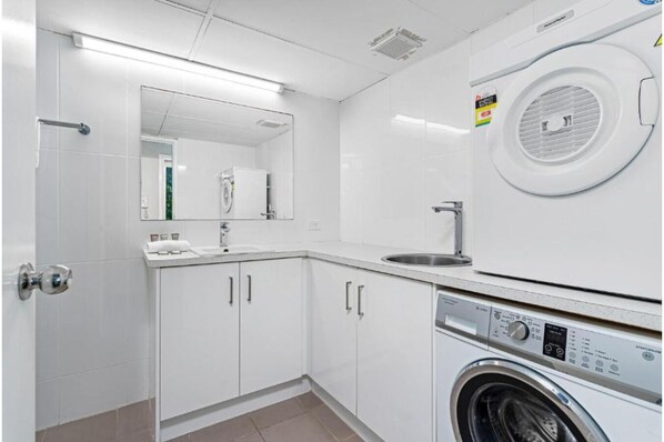 Hair dryer, towels, soap, shampoo