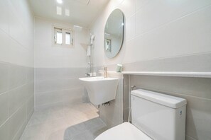 Hair dryer, towels, soap, shampoo