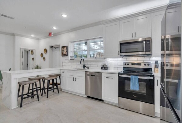 Fridge, microwave, oven, stovetop