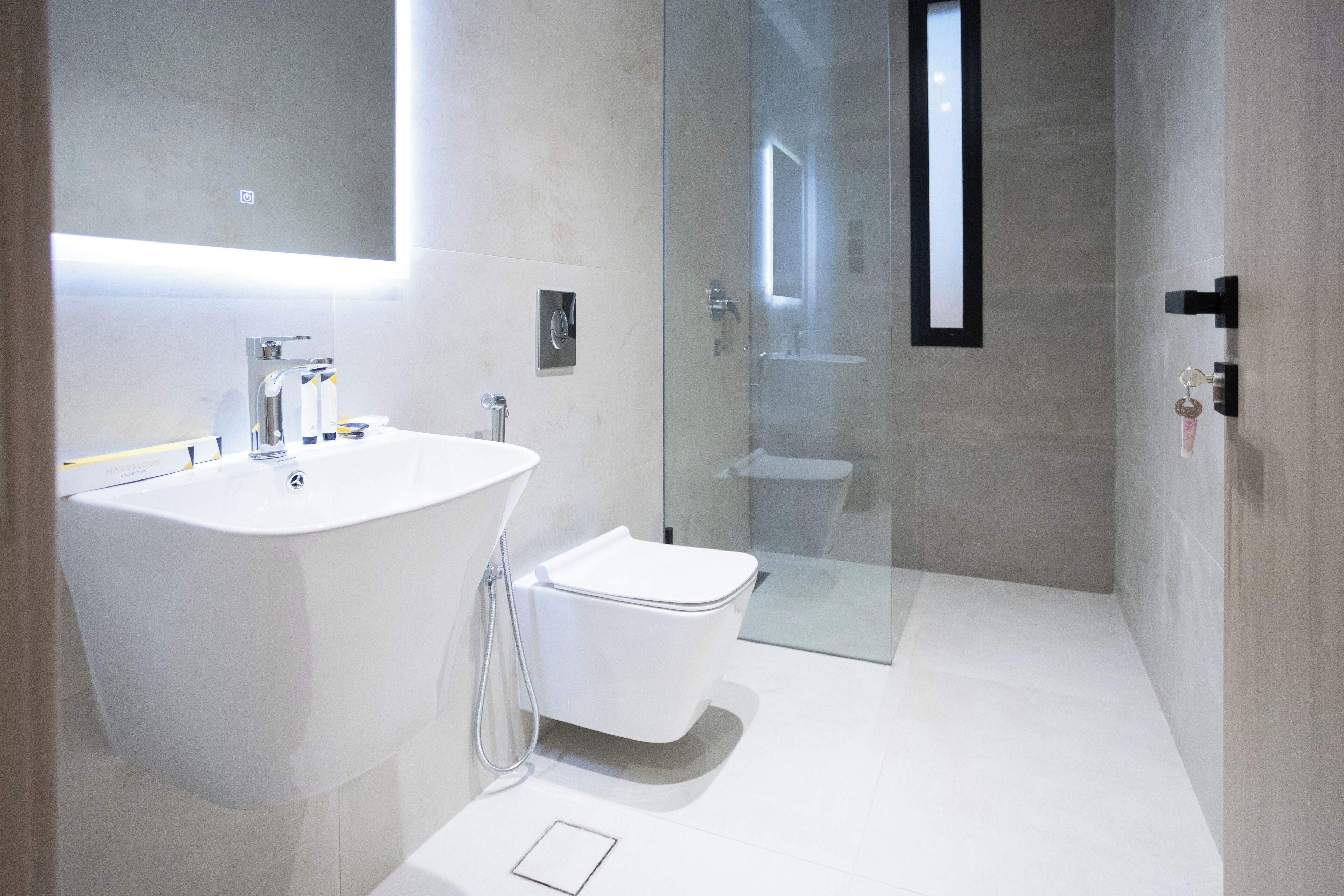 Shower, rainfall showerhead, towels, soap