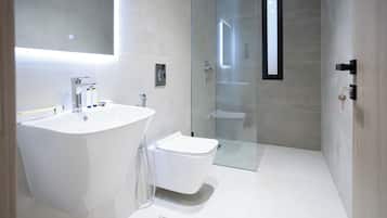 Shower, rainfall showerhead, towels, soap