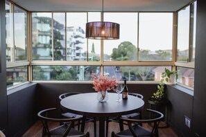 Dining - The New Farm Collection - Stylish 1BR w Pool & Gym (Brisbane)