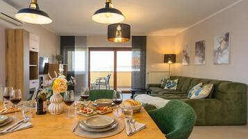 Family Apartment, 2 Bedrooms, Balcony (Double D Modern Family Apartment near) | Living area | Flat-screen TV