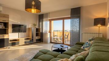 Family Apartment, 2 Bedrooms, Balcony (Double D Modern Family Apartment near) | Living area | Flat-screen TV