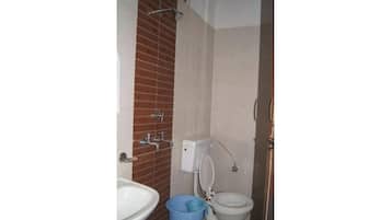 Shower, towels, soap, shampoo