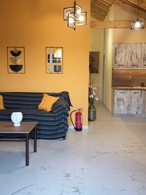 Apartment, 2 Bedrooms | Living area | 32-inch flat-screen TV with digital channels