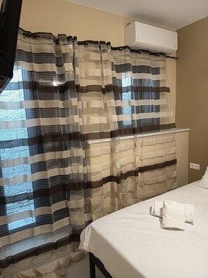 Apartment, 2 Bedrooms | In-room safe, iron/ironing board, free WiFi, bed sheets