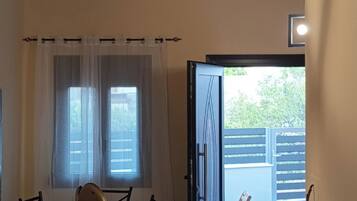 Apartment, 2 Bedrooms | Living area | 32-inch flat-screen TV with digital channels