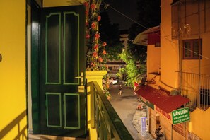 Front of property - evening/night - CozyPosy Premier Apartment (Hoan Kiem)