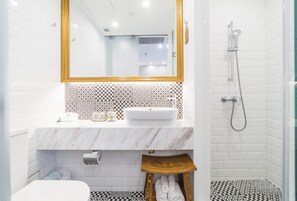 SUPERIOR COMFORT TWIN | Bathroom | Shower, free toiletries, hair dryer, slippers