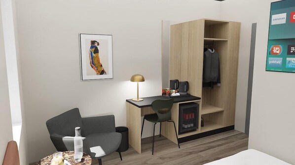 Espacio para trabajar con laptop, wifi gratis y ropa de cama 