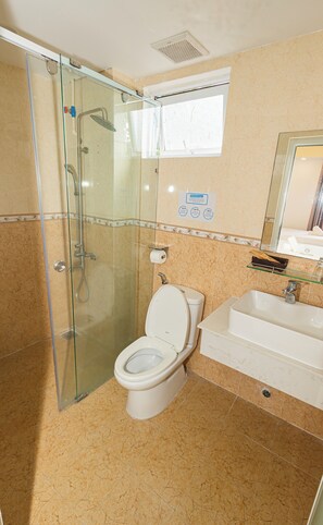 Standard Triple Room | Bathroom | Shower, hair dryer, towels, soap