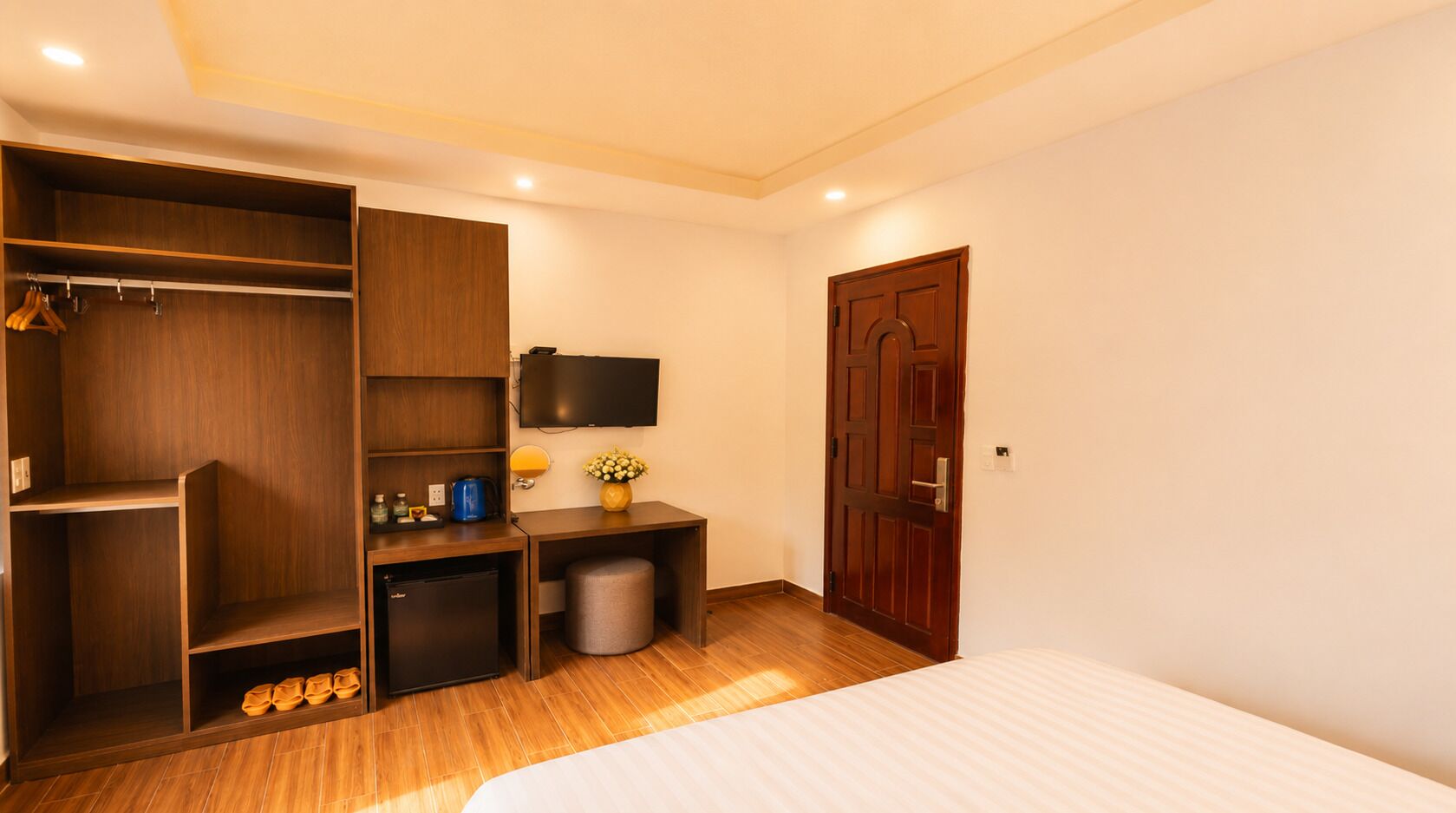 Habitación cuádruple familiar | Baño | Regadera, regadera tipo lluvia, secadora de cabello, pantuflas 