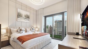 A modern bedroom with a large bed, a nightstand, a desk, and a city view through the window.