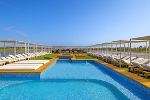 Outdoor pool, pool umbrellas, pool loungers