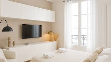 Apartamento luxo, vista para o pátio | Área de estar | Smart TV 80 cm com canais digitais