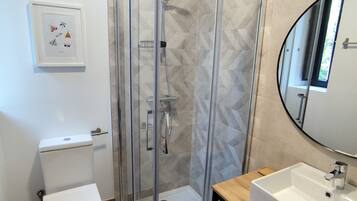 Shower, towels, soap, shampoo