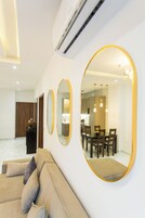 Luxury Apartment, 1 Bedroom | Living area | 55-inch Smart TV with digital channels, Netflix, Hulu