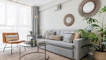 Comfort Apartment | Living area | 50-cm TV with cable channels