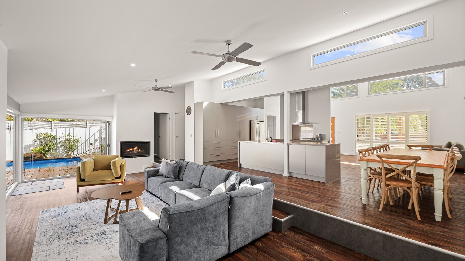 TV, fireplace, books