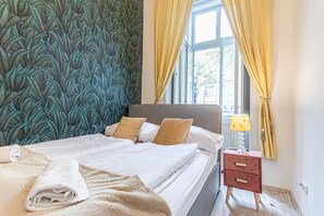 1 slaapkamer, een strijkplank/strijkijzer, wifi, beddengoed