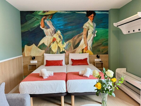 Estudio superior, terraza | Cunas (de pago), wifi gratis, ropa de cama