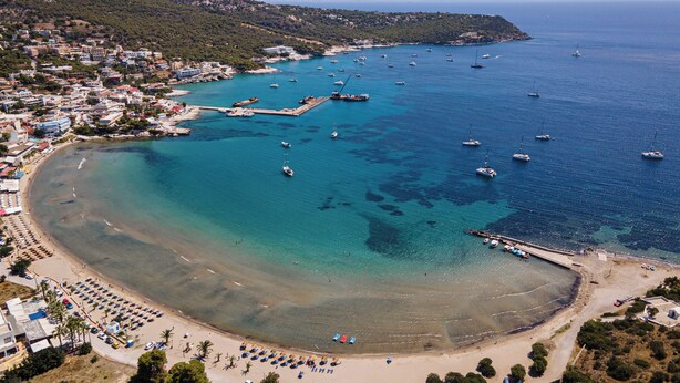 An aerial view of a coastal town with a beach, boats, and a pier. - Aphaias Residence Two, Aphaias Villas (Aegina)