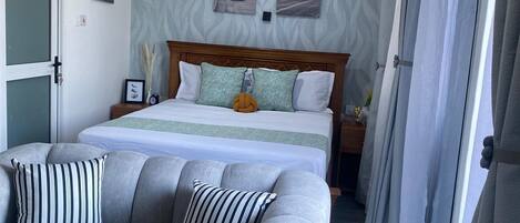 1 غرفة نوم ومكواة/لوح كي وخدمة الإنترنت وملاءات أسرّة