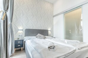 1 slaapkamer, een strijkplank/strijkijzer, wifi, beddengoed