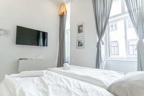 1 slaapkamer, een strijkplank/strijkijzer, wifi, beddengoed