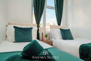 5 habitaciones, tabla de planchar con plancha, wifi y ropa de cama