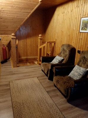 30-cm LED TV with satellite channels, DVD player, books