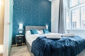 1 dormitorio, tabla de planchar con plancha, wifi y ropa de cama