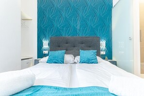 1 habitación, tabla de planchar con plancha, wifi y ropa de cama 