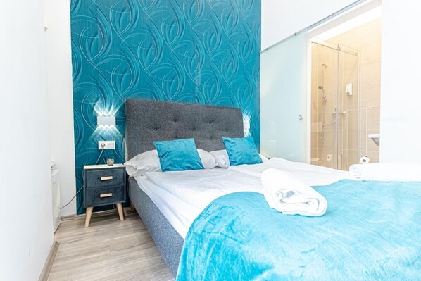 1 habitación, tabla de planchar con plancha, wifi y ropa de cama 