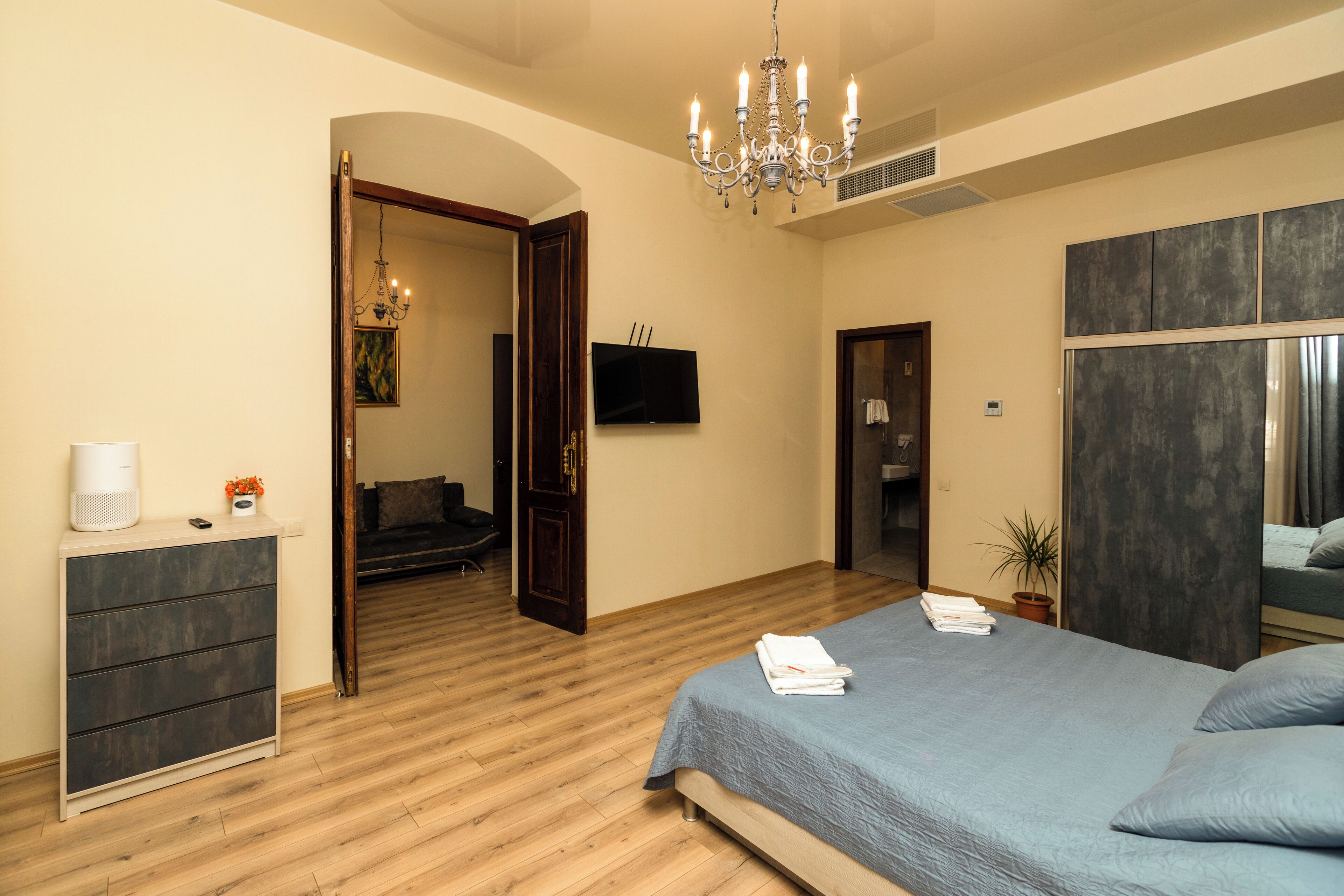 Design Suite | Living area | 120-cm Smart TV with satellite channels, video game console, printers