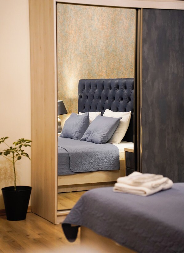 Design Suite | Living area | 120-cm Smart TV with satellite channels, video-game console, printers