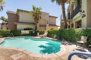 Outdoor pool, a heated pool - Designer desert condo. Sleeps 4. 4 pools and spas in the complex. Dogs welcome! (La Quinta)