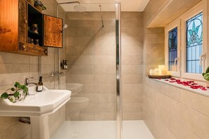 Jetted tub, hair dryer, bathrobes, slippers