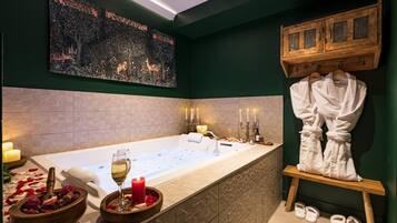 Jetted tub, hair dryer, bathrobes, slippers