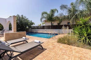 Outdoor pool, sun loungers
