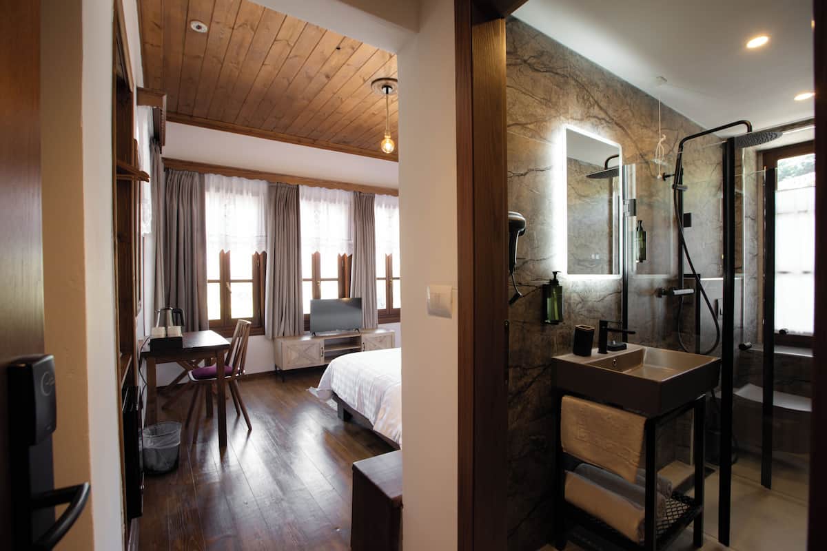 Chambre Deluxe Double ou avec lits jumeaux | Chambres insonorisées, Wi-Fi gratuit