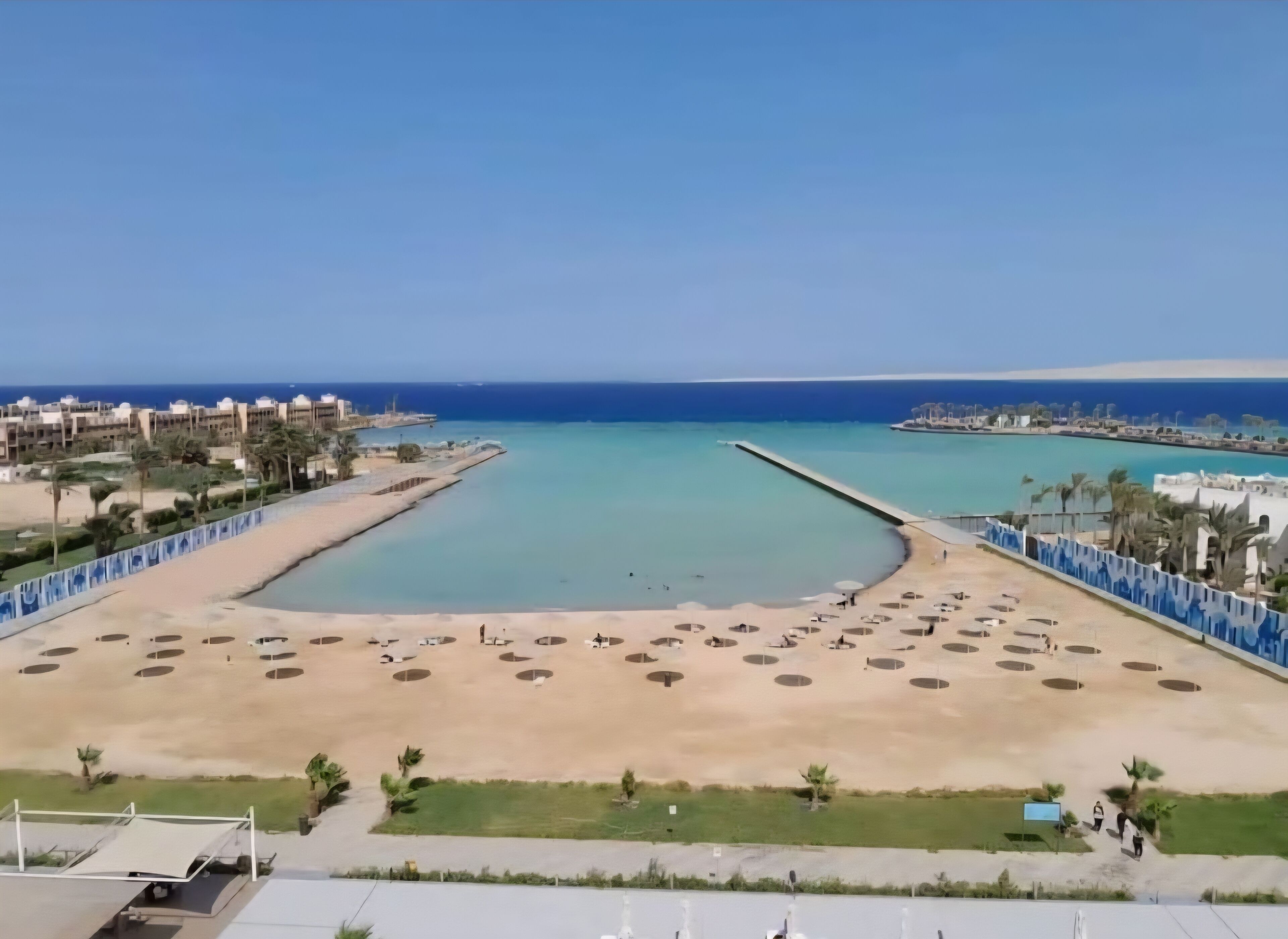 On the beach, sun loungers, beach towels