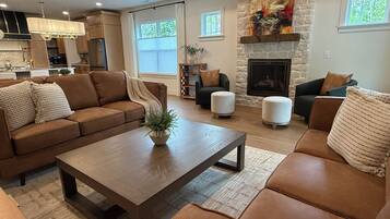 Smart TV, fireplace, books, printers