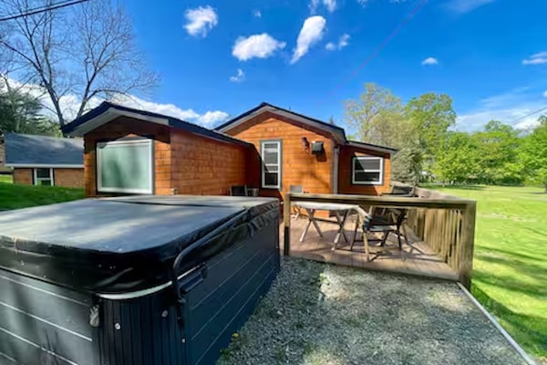 Unwind on the deck or soak in the hot tub under starry skies.