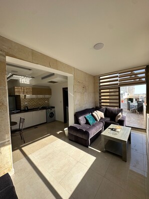 Apartment, 1 Bedroom, Accessible, Smoking | Living room - Charming Amman Apartment With Electric Heating & Pool Access (Amman)