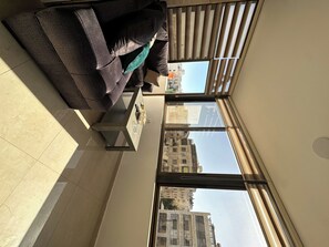 Apartment, 1 Bedroom, Accessible, Smoking | Living area - Charming Amman Apartment With Electric Heating & Pool Access (Amman)