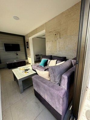 Apartment, 1 Bedroom, Accessible, Smoking | Living area - JRE Abdoun Rooftop 1bedroom Kh&sh 03 (Amman)