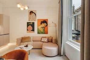 Apartamento superior | Área de estar
